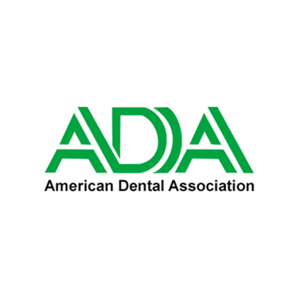 A green and white logo of the american dental association.